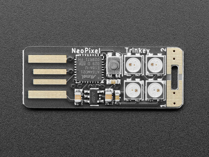 Adafruit Neo Trinkey - SAMD21 USB Key with 4 NeoPixels by Adafruit - The Pi Hut