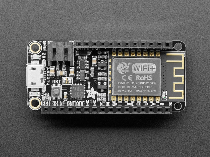 Assembled Feather HUZZAH w/ ESP8266 WiFi With Stacking Headers by Adafruit - The Pi Hut