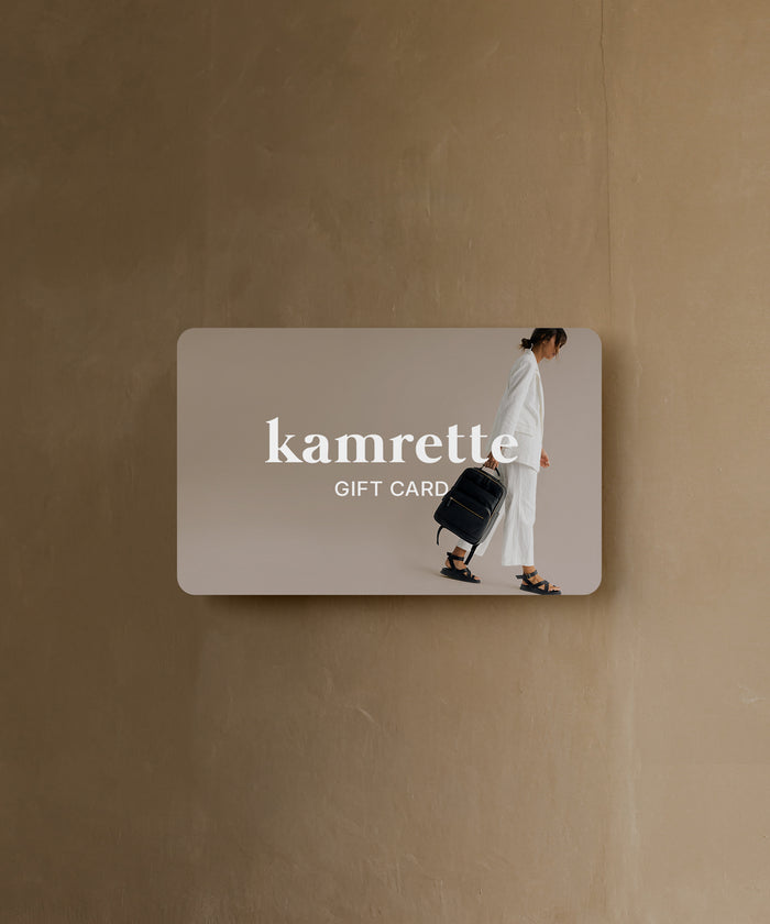 Gift card featuring photogapher with lyra camera backpack and professional camera