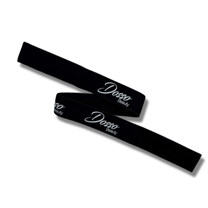 Two black elastic edge bands with Dosso Beauty logo are laid flat and slightly overlapping on a white background.
