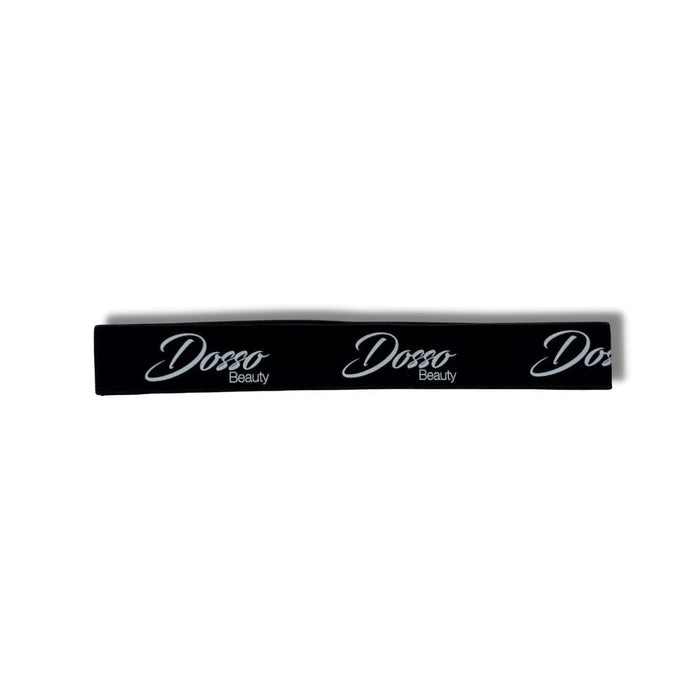 Black elastic edge band with repeated Dosso Beauty logo is laid flat horizontally on a white background.