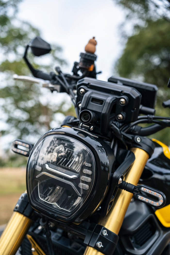 INNOVV 25mm lens protector real installation shot on motorcycle front camera