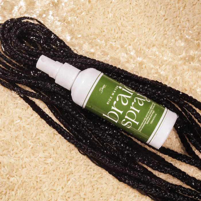 Dosso Beauty rice water braid spray on braids hydrating protective styles scalp care