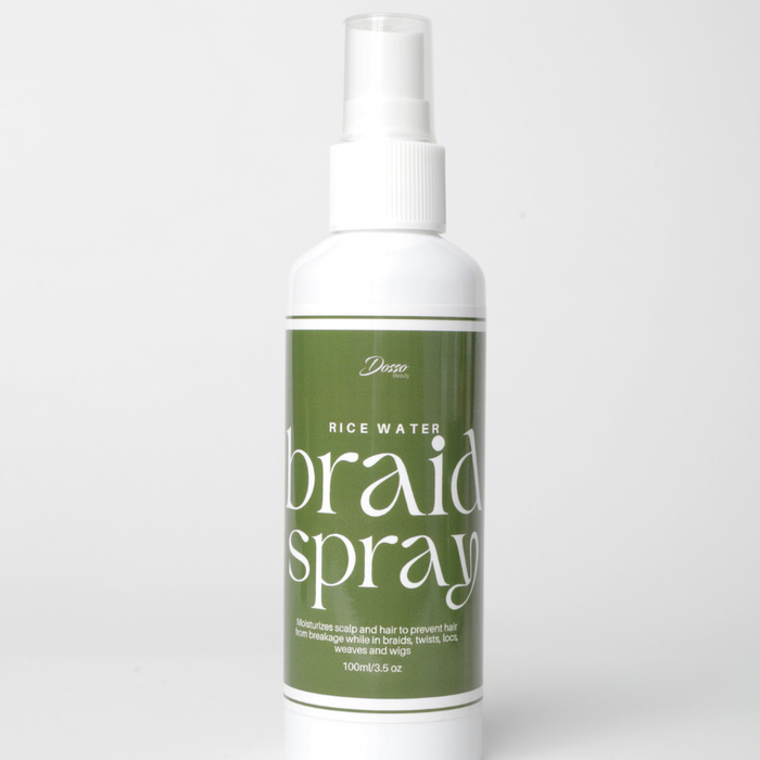 Bottle of rice water braid spray on a white background