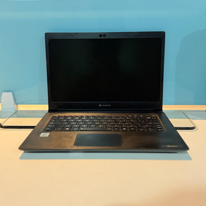A black Lenovo laptop with an open screen, placed on a light-colored surface against a blue background.